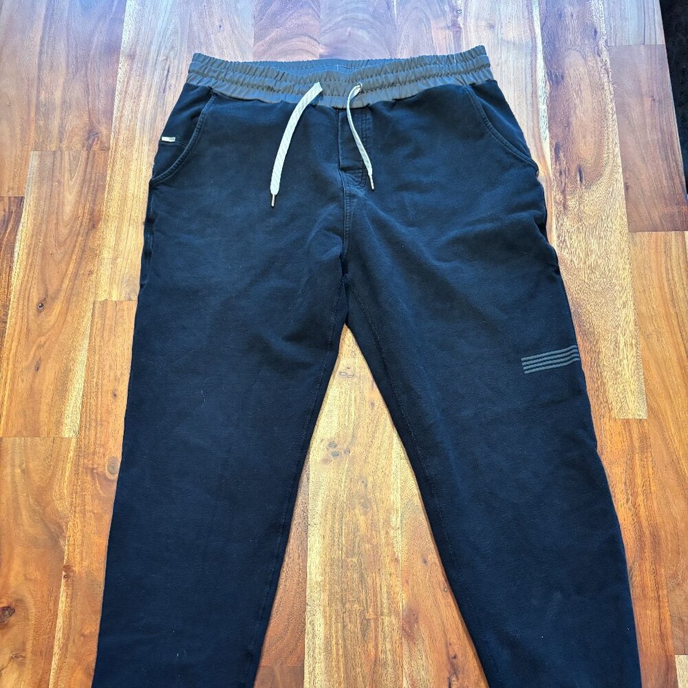 Vuori Black Drawstring Joggers with Subtle Stripe Detail